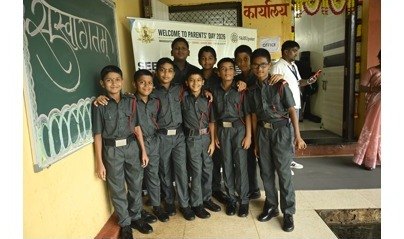 Cadets standing together at the school entrance during Parents' Day 2026